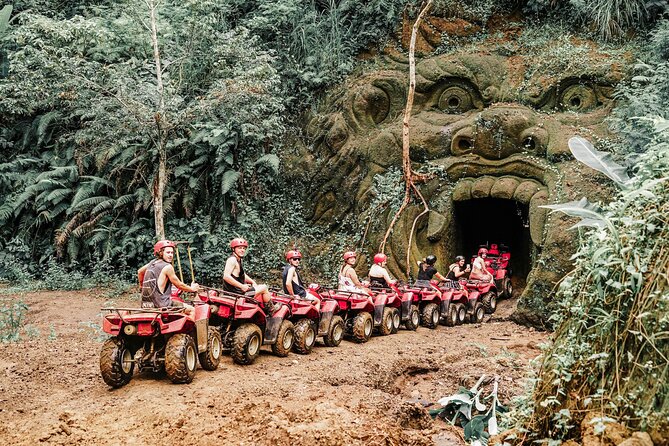 ATV Quad Bike Bali with Waterfall Gorilla Cave and Lunch - Mud, jungle, and rice fields near Ubud