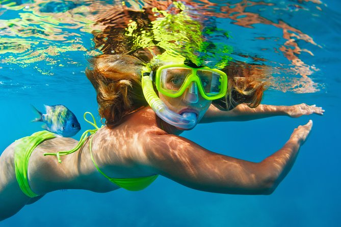 Bali Blue Lagoon Snorkeling Experience - Arriving at Blue Lagoon and boarding the jukung