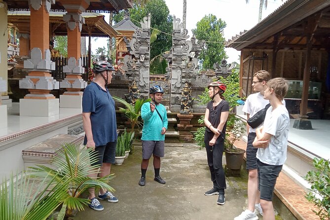 Bali Downhill Natural Cycling Tour & visit Volcano - Getting fitted at Balai Desa Pekraman Pukuh