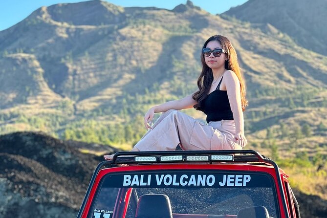 Bali: Mount Batur Jeep Sunrise & Hot Springs - All Inclusive - Riding across Mount Batur’s black lava