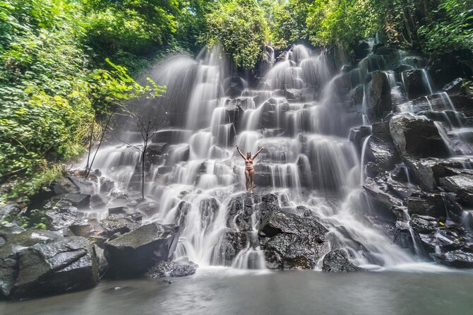 Bali: Pakerisan River Tubing Adventure with Rapids, Guide & Lunch - The waterfall and Tirta Geruh holy spring