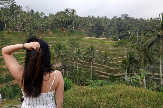 Bali Tour: Cepung Waterfall, Penglipuran Village, & Mt Batur View - Walking into Tukad Cepung Waterfall