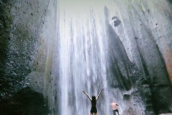 Bali Waterfalls Private Day Tour - Kanto Lampo: a low, photogenic cascade