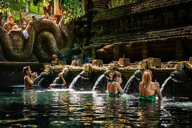 Best of Ubud: Waterfalls, Temple & Rice Terraces Private Day Tour - Kanto Lampo Waterfall and its low rock cascades