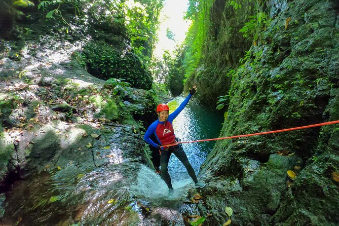 Canyoning Adventure in Sambangan Canyon - The 20-meter zip-line and swimming sections