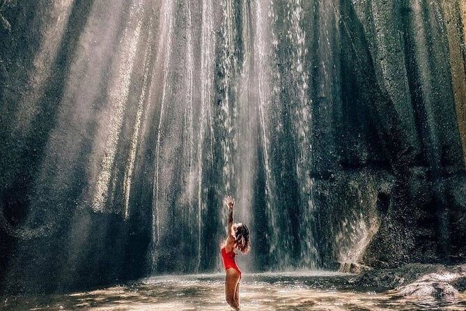 Discover the best waterfalls in Ubud and rice terraces tour - Kanto Lampo Waterfall, rock shelves and river pools