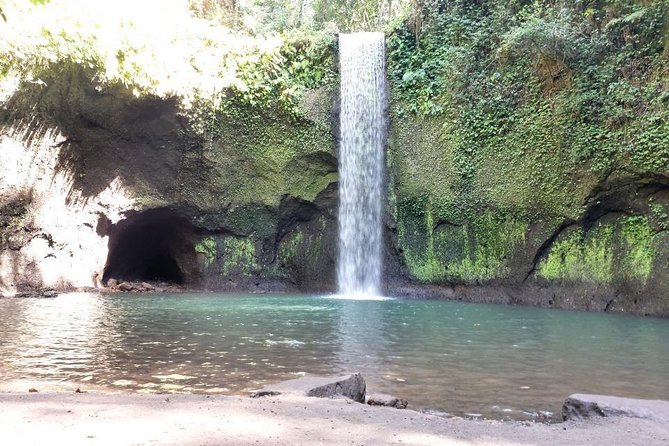 Get wet on Bali's most stunning waterfalls - Tukad Cepung, a waterfall hidden inside the jungle