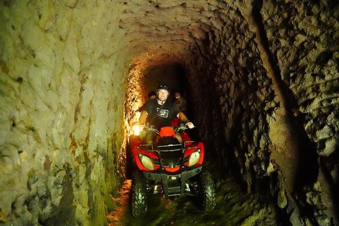 Jungle ATV Quad Bike Through Gorilla Face Cave - Hotel pickup, traffic, and the real time commitment