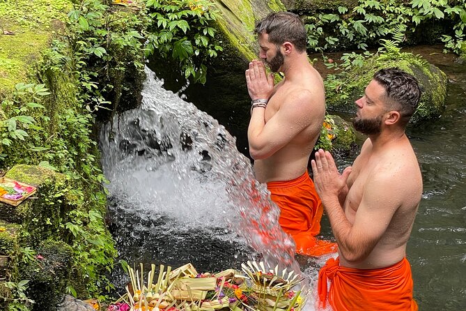 Melukat Purification Ceremony at Mengening Temple - Learning the ritual from guide Ketut