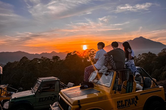 Mt Batur Jeep Sunrise Tour - Sunrise above the volcanic tracks