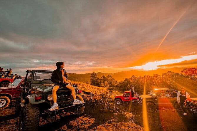 Mt Batur Sunrise Jeep & Natural Hot Spring Tour - Sunrise over Lake Batur and the caldera