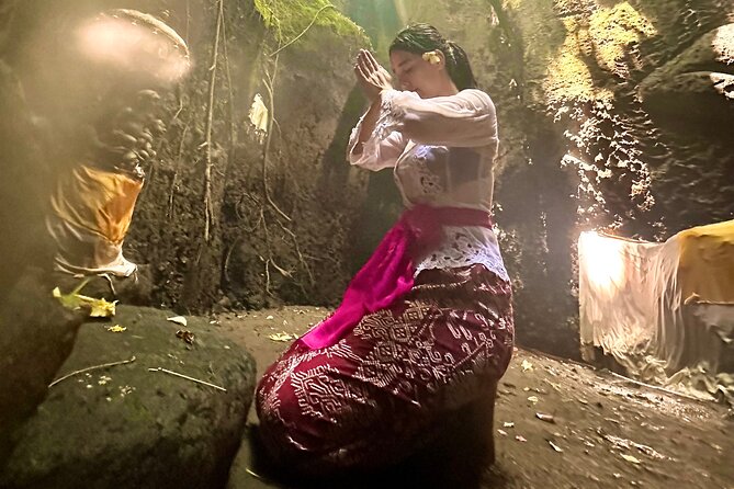 Purifications at Beji Griya Waterfalls - What the priest and offerings add