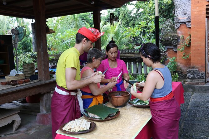 Rural Charm of Bali Tour - Grinding spices in a traditional kitchen