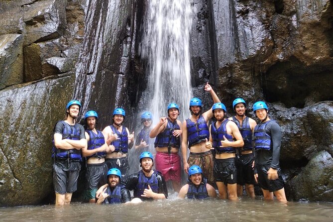 Ubud ATV Quad Bike with Ayung River Rafting Experience - ATV riding through rice fields and waterfalls